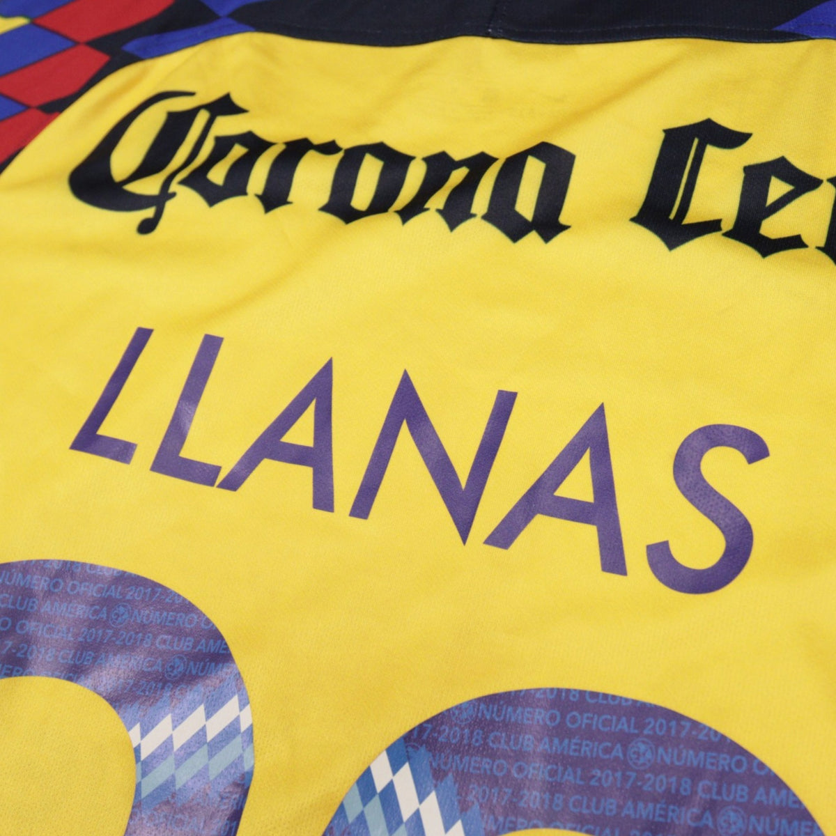 Close-up of Llanas 22 nameset and Corona Cero branding on back