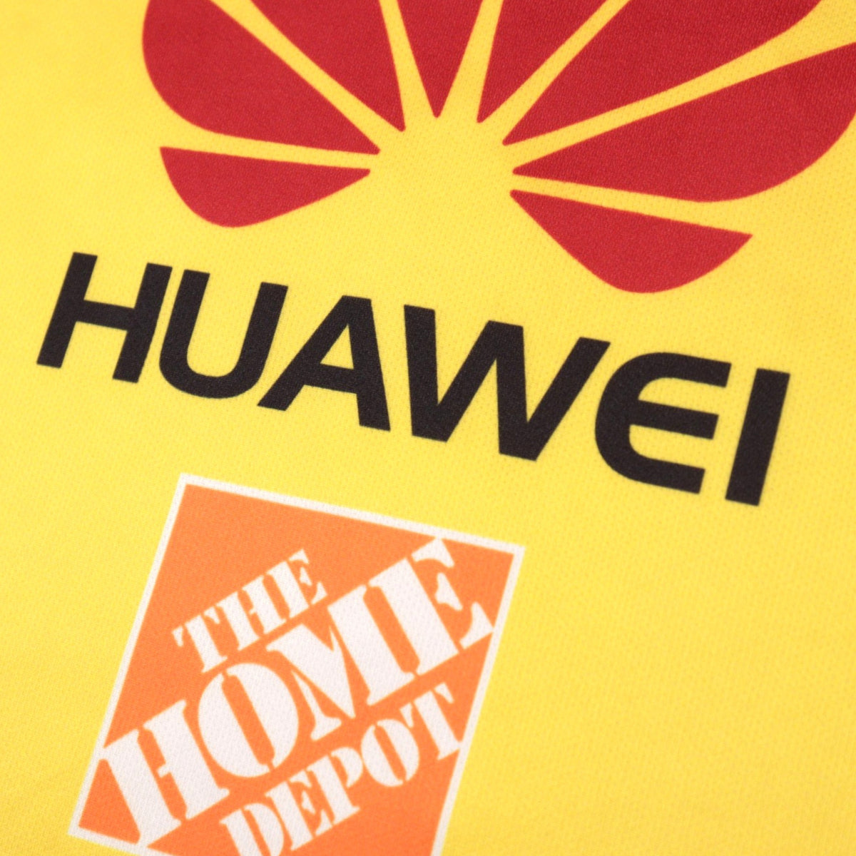 Close-up of Huawei and The Home Depot sponsor logos on front
