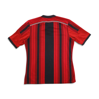 Back detail of the AC Milan home shirt showing the striped pattern
