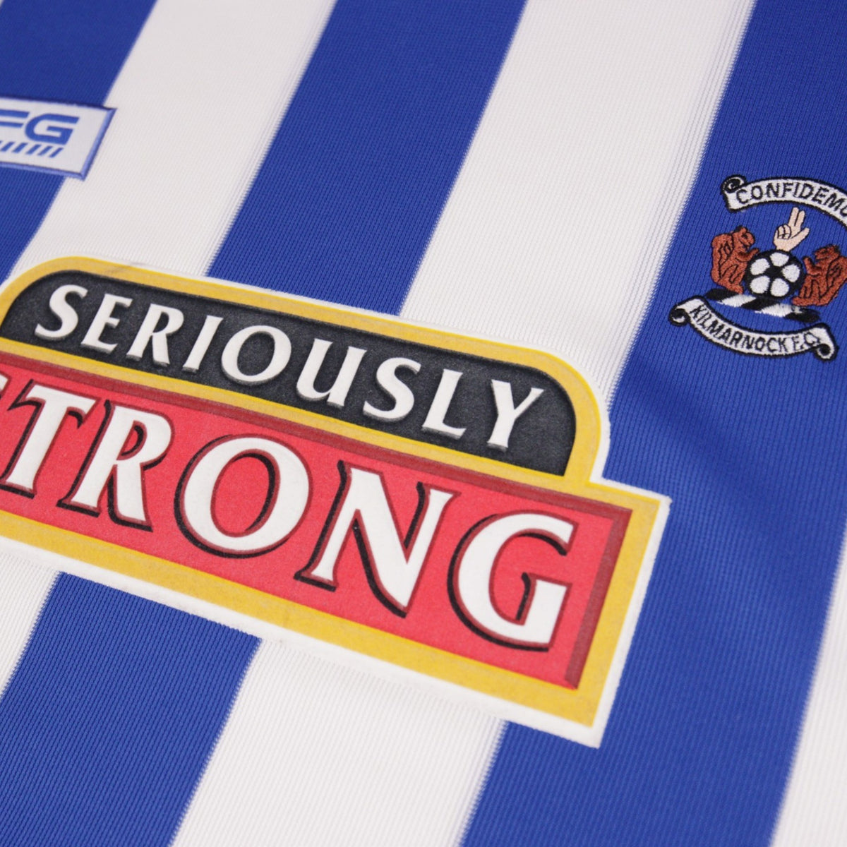 Close-up of Kilmarnock crest and Seriously Strong sponsor logo on shirt front