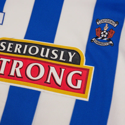 Close-up of Kilmarnock crest and Seriously Strong sponsor on the chest