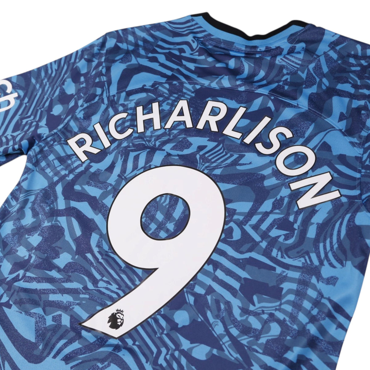 Close-up of Richarlison number 9 printing on the back of the shirt