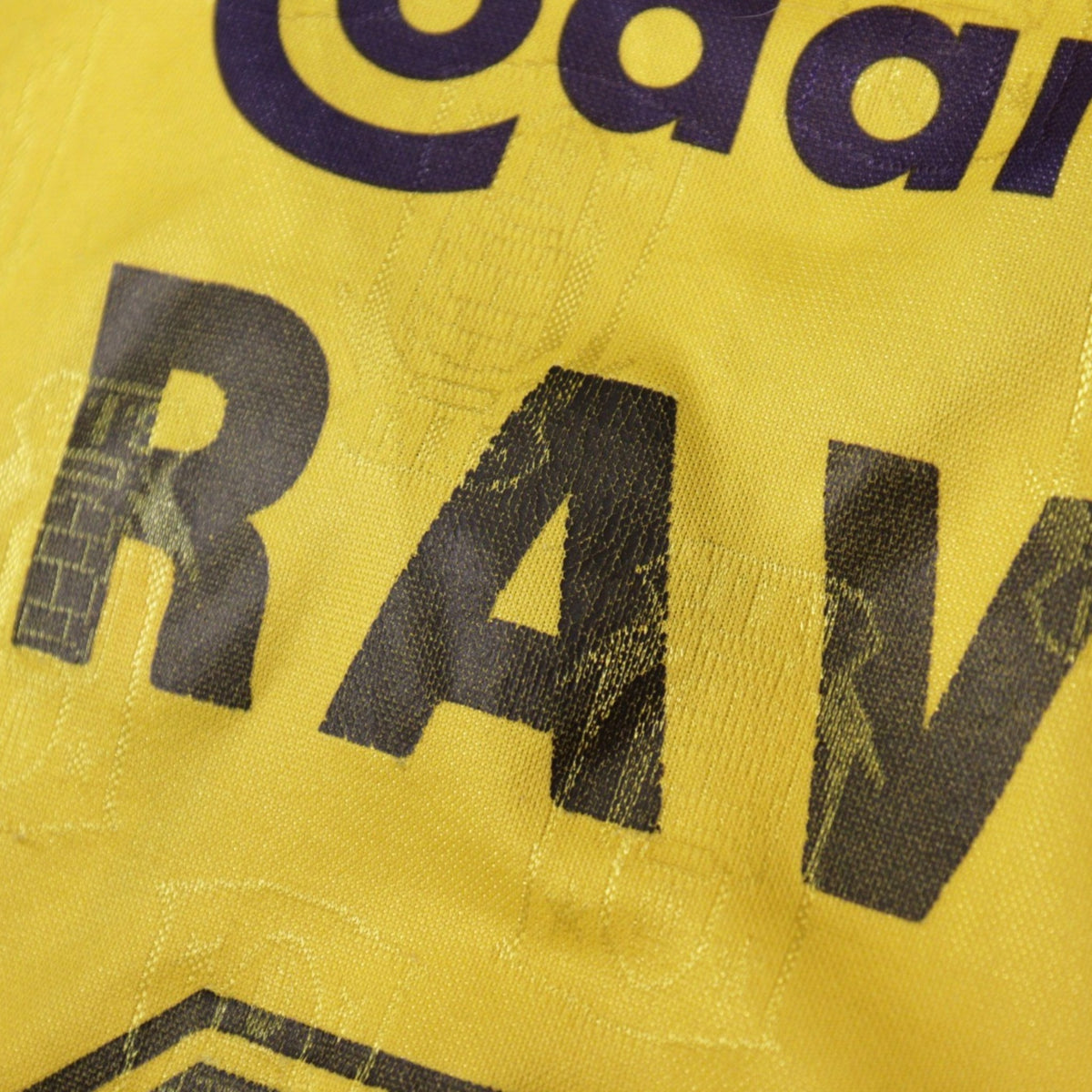 Close-up of cracking on the printed Ravn name and number on the back
