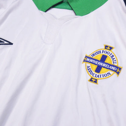Close-up of the Irish Football Association crest on the Northern Ireland away shirt