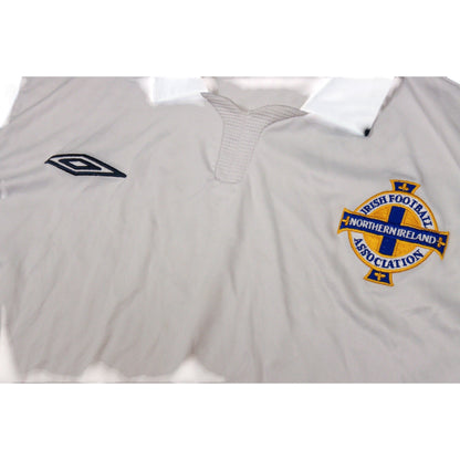 Close-up of Northern Ireland crest and Umbro logo on chest