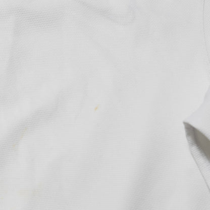 Close-up of fabric showing minor mark on France away shirt