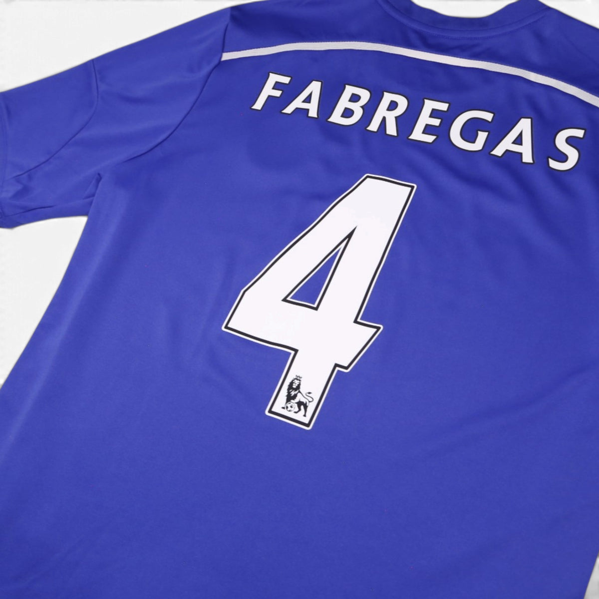 Close-up of Fabregas name and number 4 on Chelsea 2014/15 home shirt