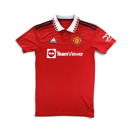 Front of 2022/23 Manchester United home shirt with TeamViewer sponsor and adidas logo