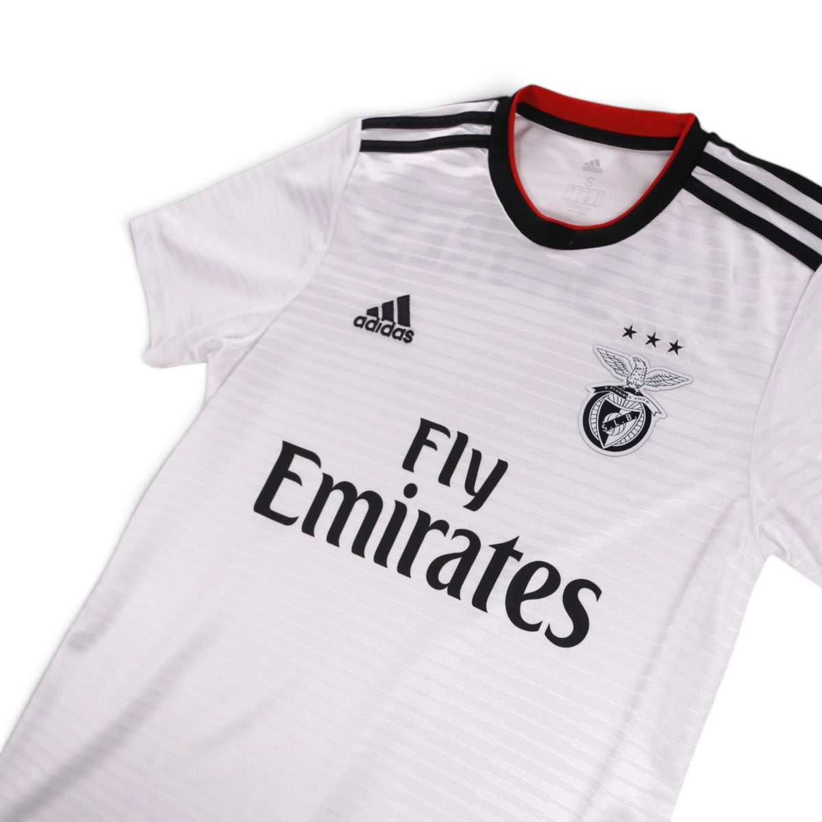 Close-up of Benfica away shirt collar, adidas logo, crest and size S label