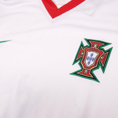 Close-up of the Portugal crest and Nike swoosh on the chest
