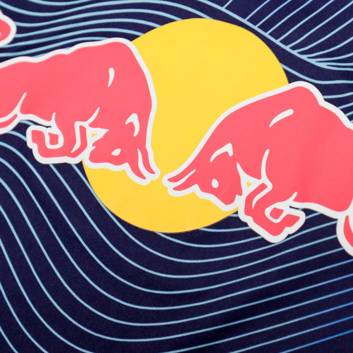 Close-up of Red Bull sponsor logo printed on the chest