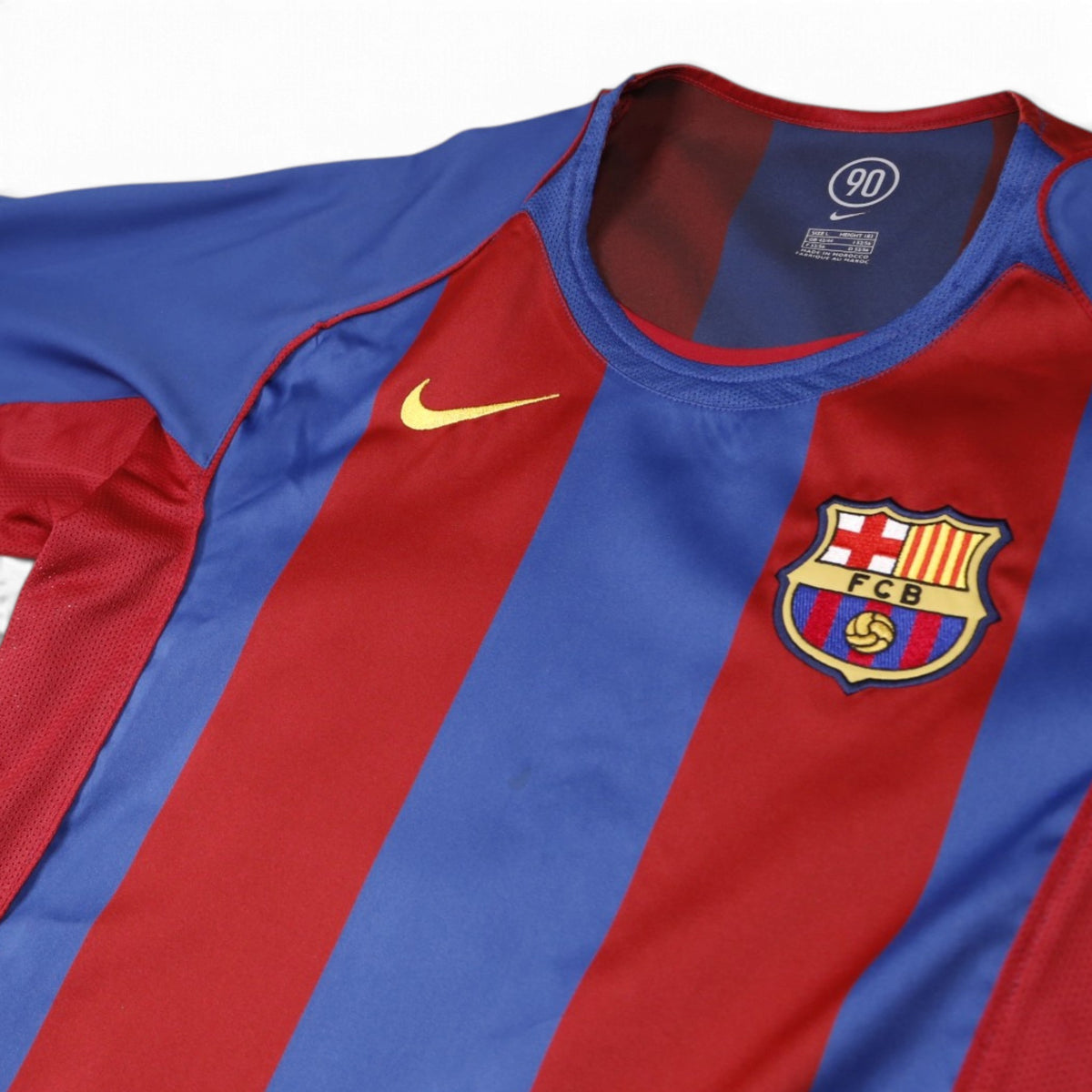 Close-up of Nike neck label and FCB crest on 2004/05 Barcelona home shirt