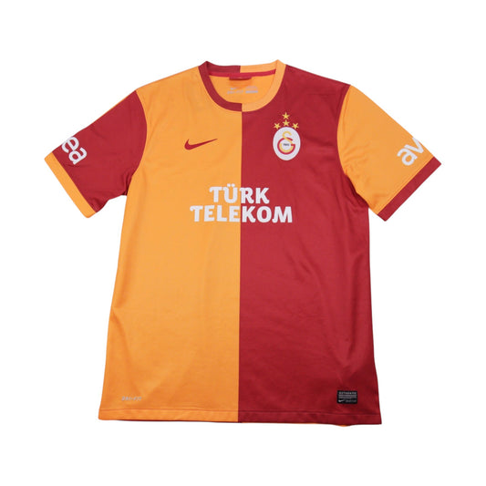 Galatasaray 2013/14 home shirt front view, red and yellow halved design with Türk Telekom sponsor