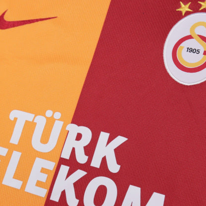 Close-up of Nike swoosh, Türk Telekom sponsor and Galatasaray crest on front