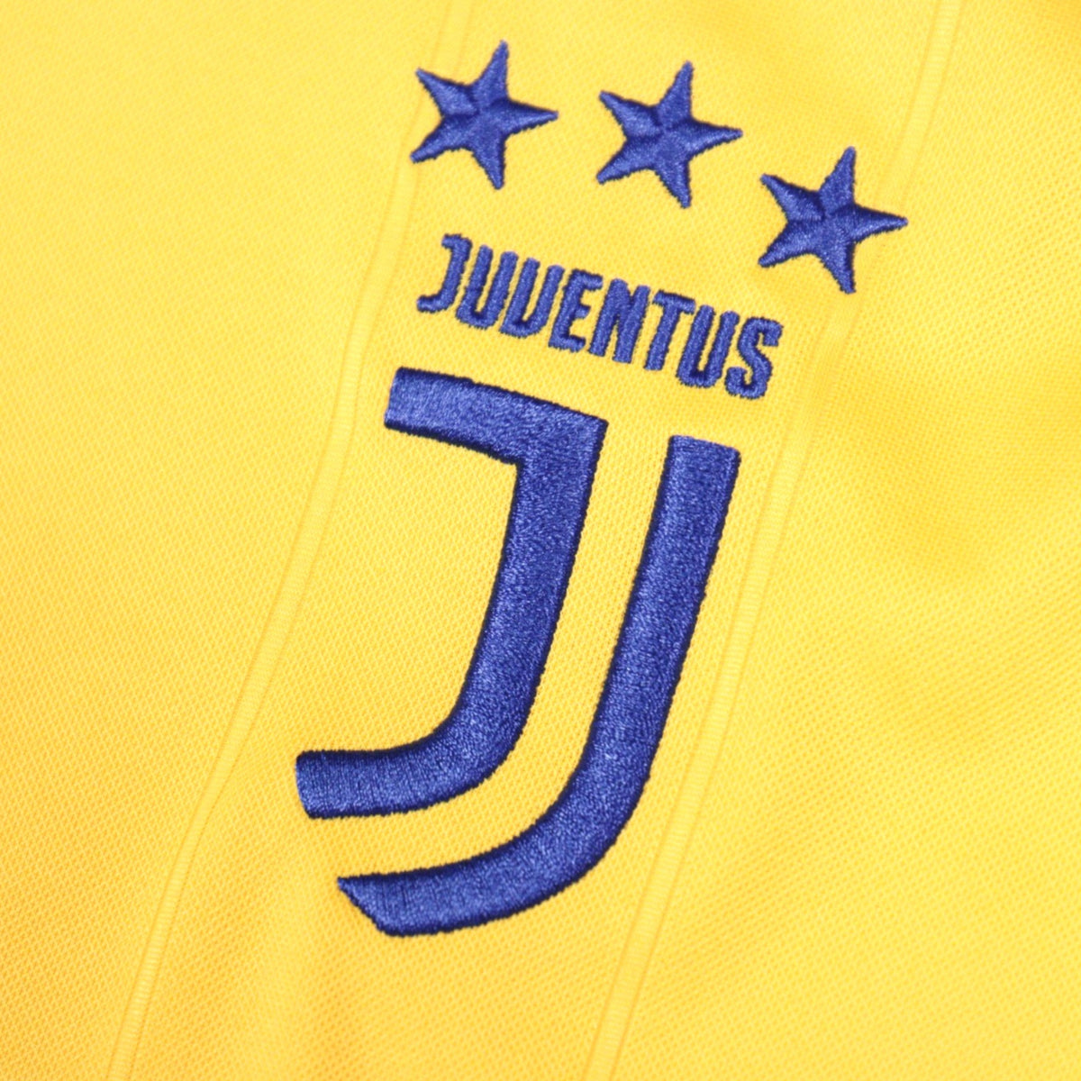 Close-up of Juventus embroidered crest with three stars