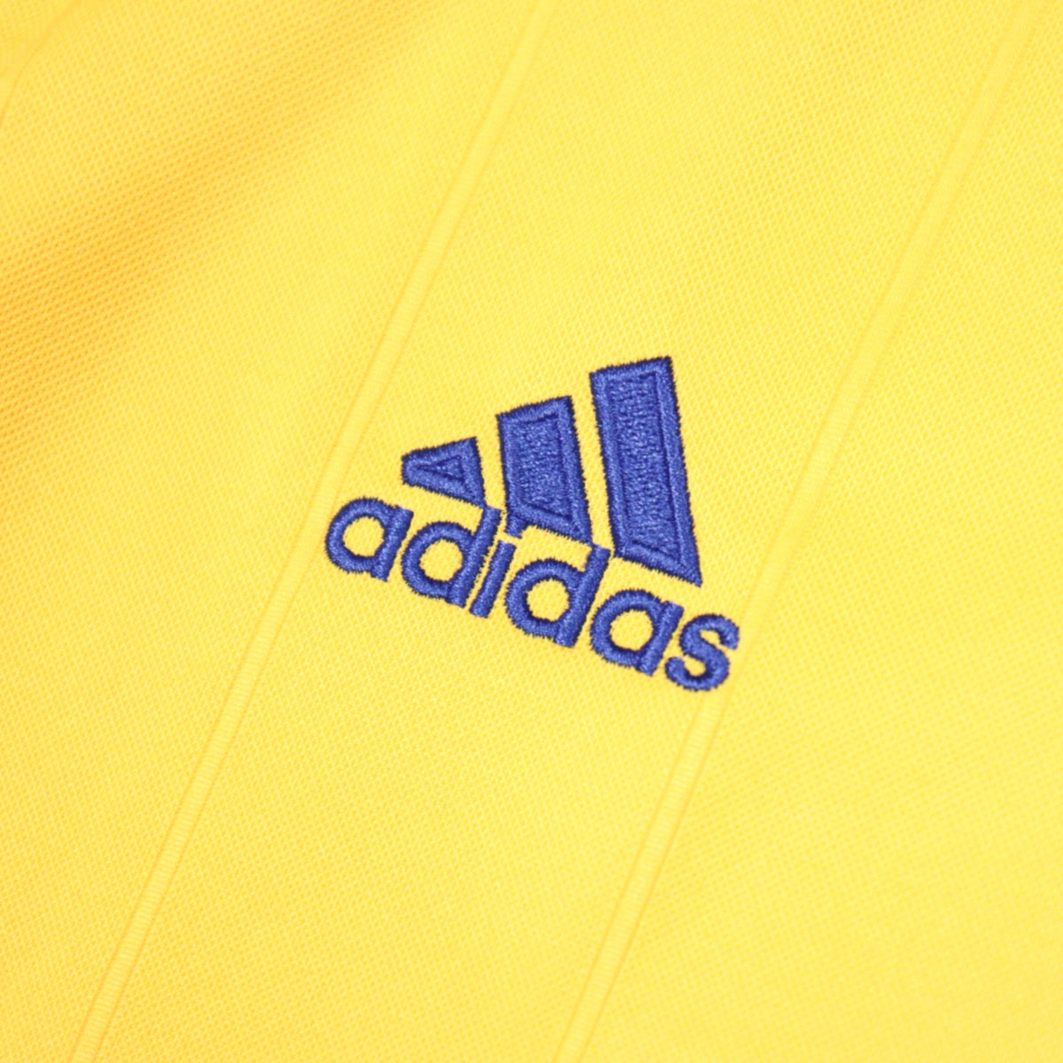 Close-up of adidas logo on Juventus away shirt sleeve