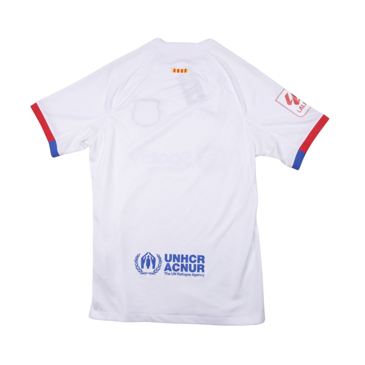 Barcelona 2023/24 away shirt back view showing UNHCR/ACNUR logo and La Liga patch