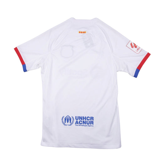 Barcelona 2023/24 away shirt back view showing UNHCR/ACNUR logo and La Liga patch