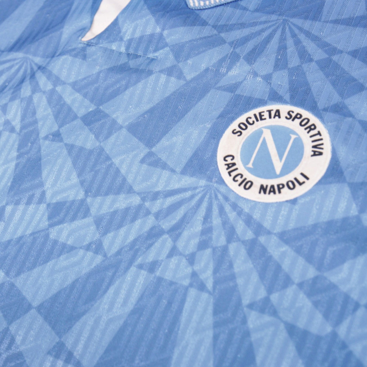 Close-up of the Societa Sportiva Calcio Napoli crest on the 1991/93 home shirt