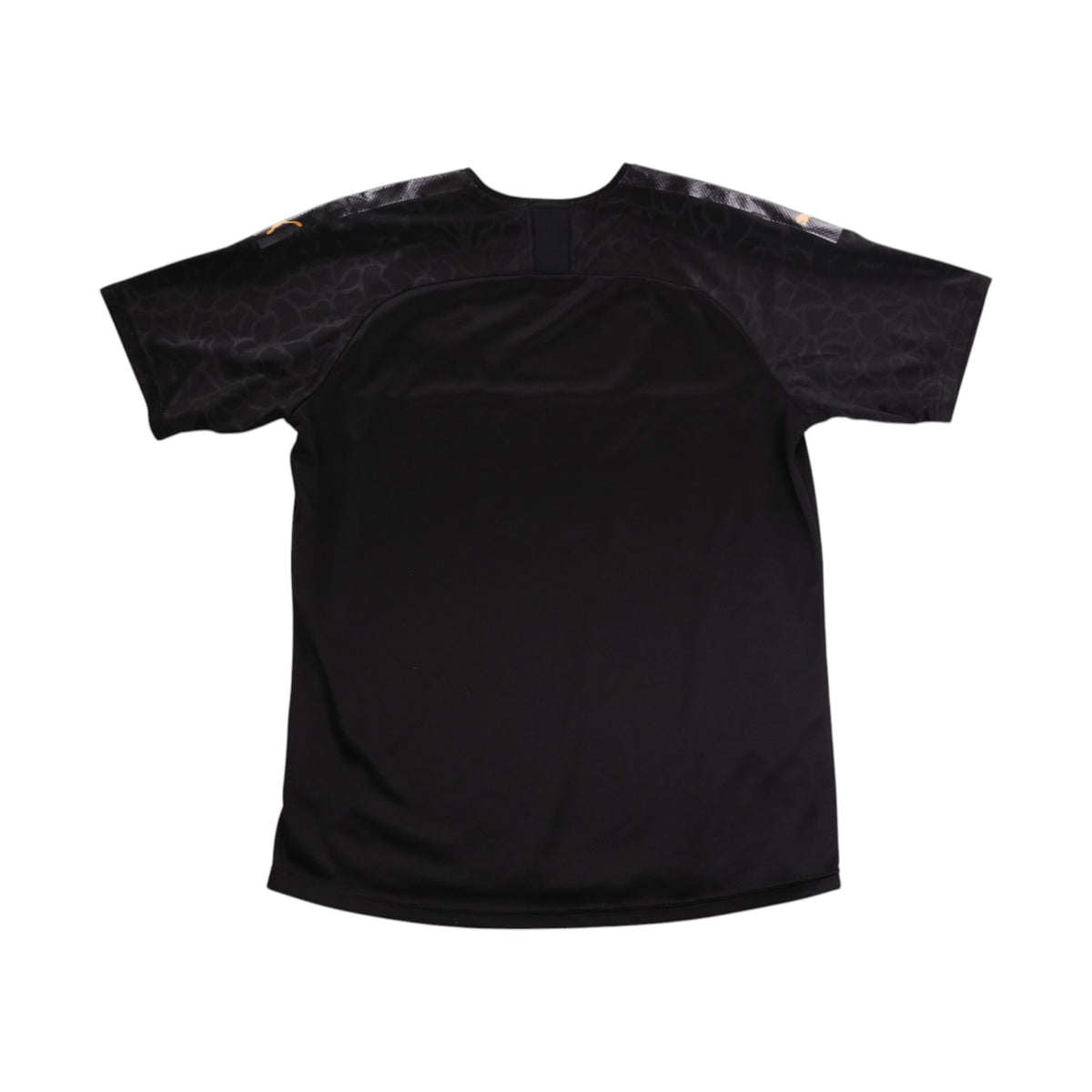 Back of black Olympique Marseille third shirt showing plain rear and camouflage-pattern sleeves