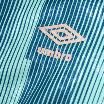 Close-up of the Umbro logo on the pinstriped fabric