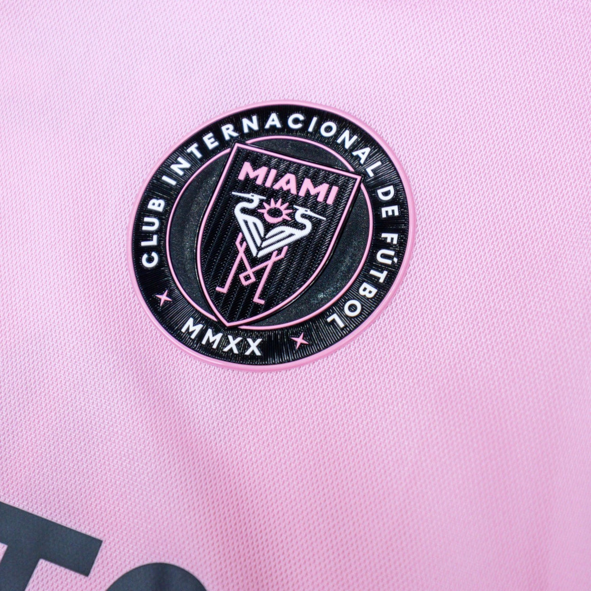 Close-up of the Inter Miami CF circular crest with heron emblem