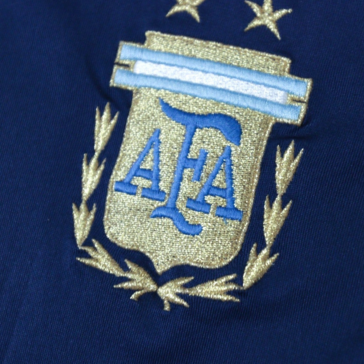 Close-up detail of the embroidered AFA crest