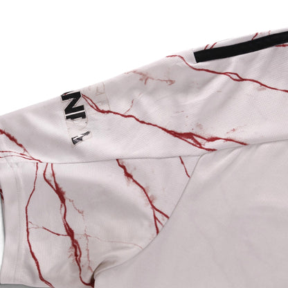 Close-up of sleeve showing Visit Rwanda logo and adidas stripe