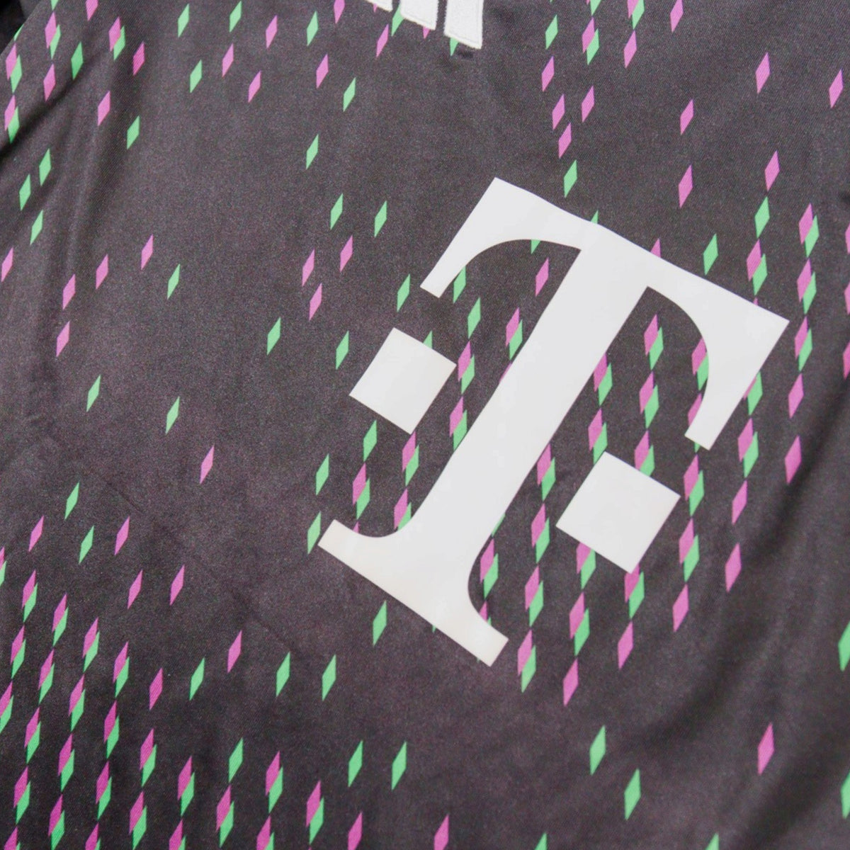 Close-up of Telekom sponsor print on the chest