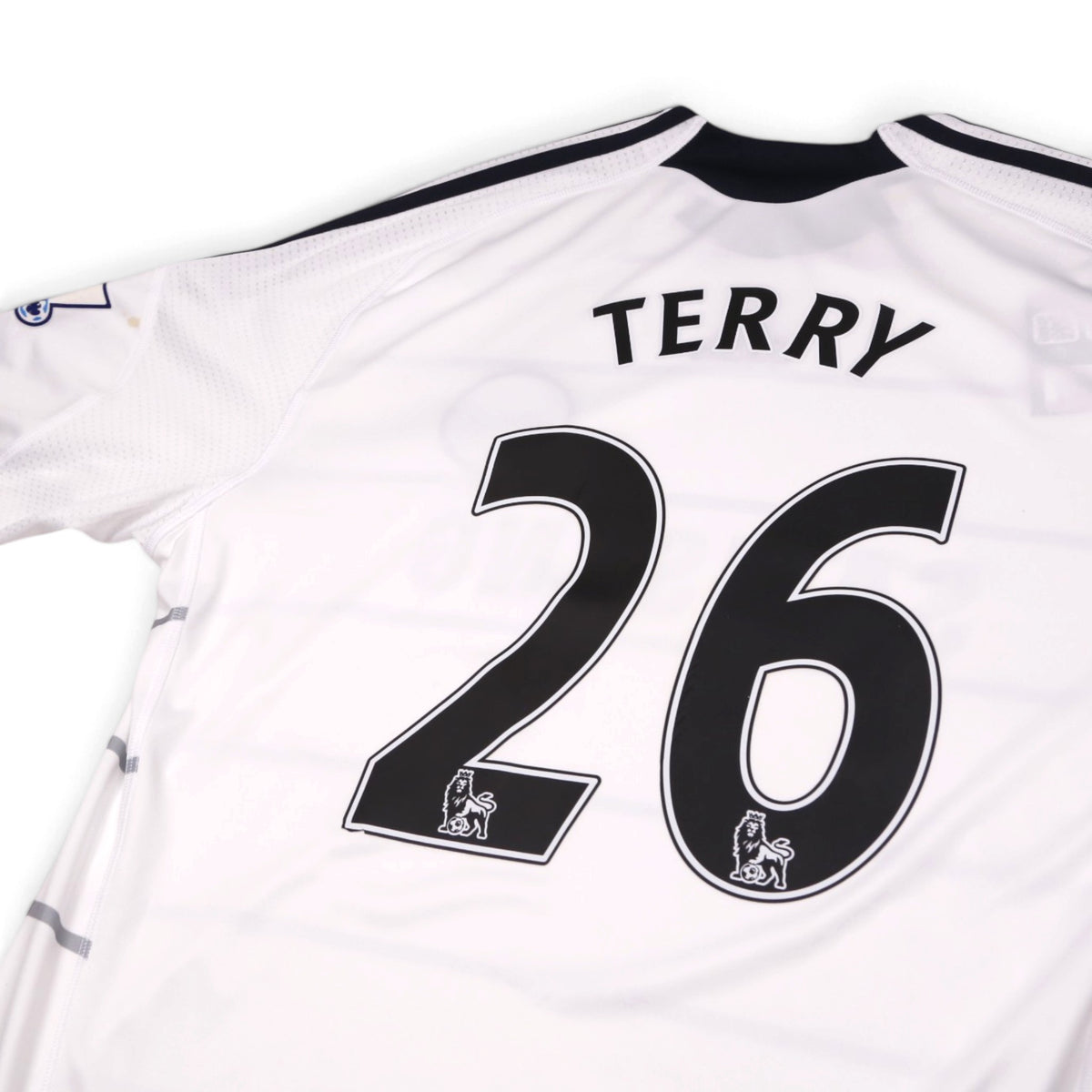 Close-up of the back collar area showing Terry 26 printing and Premier League patch