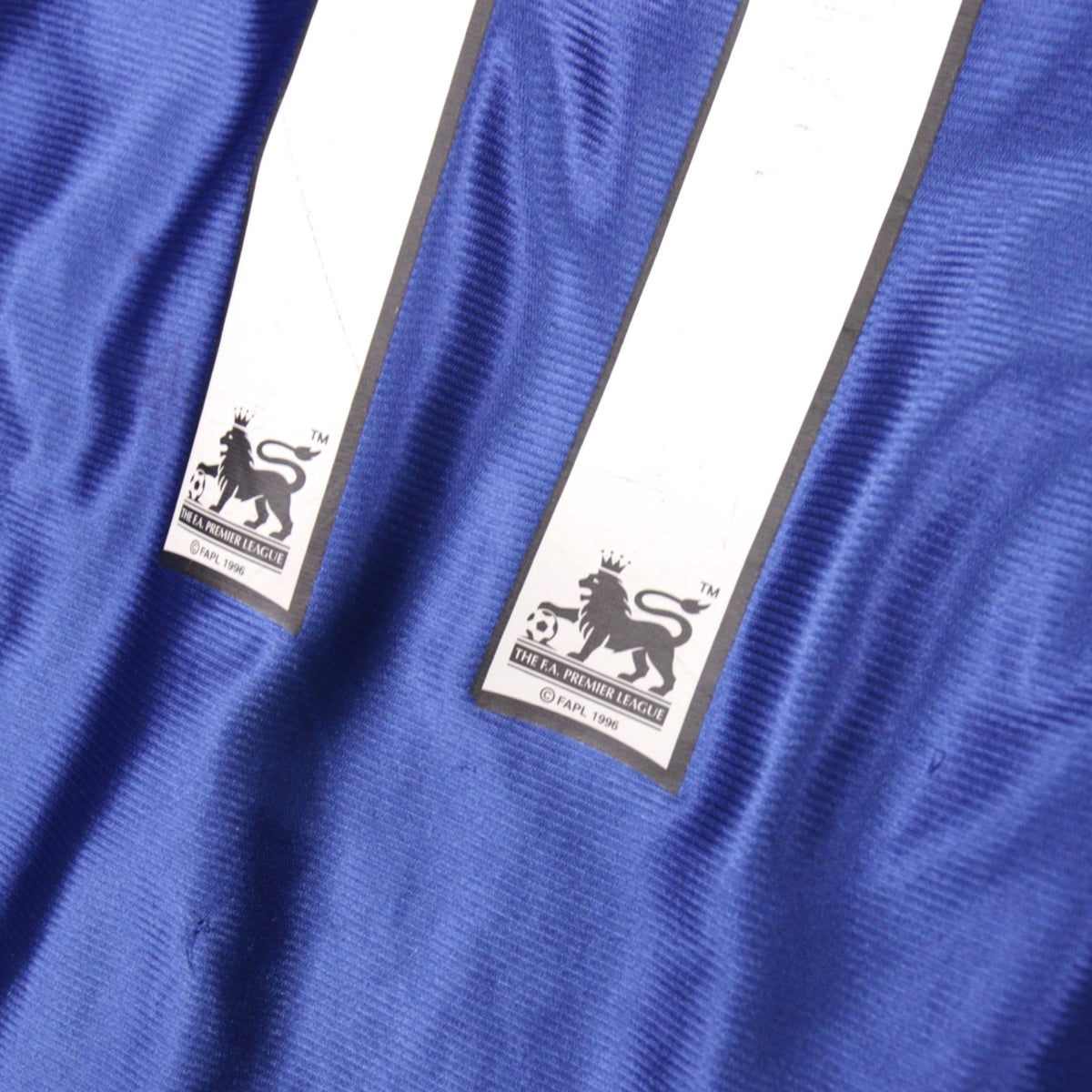 Close-up of Premier League sleeve patches on Ipswich Town shirt