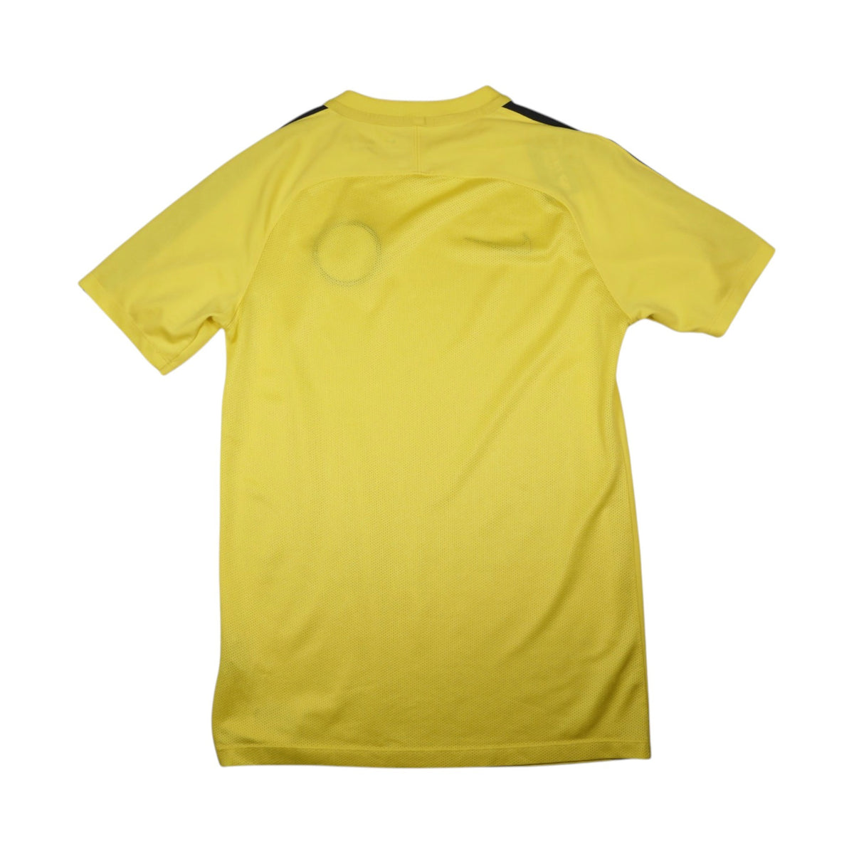 Manchester City yellow Nike training shirt back view showing plain design