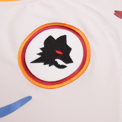 Close-up of the Roma wolf-head crest embroidery