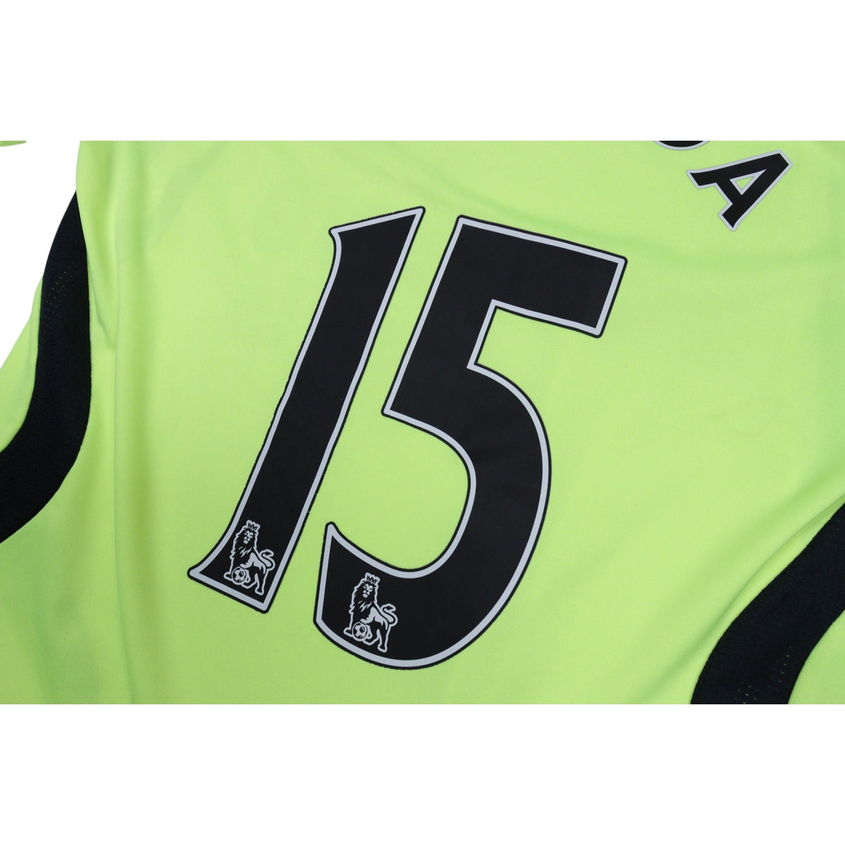 Close-up of Malouda number 15 print with Premier League lion patches