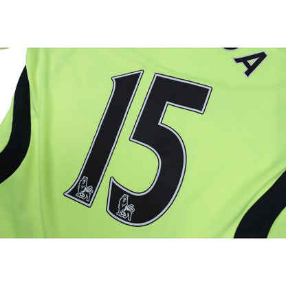 Close-up of Malouda number 15 print with Premier League lion patches