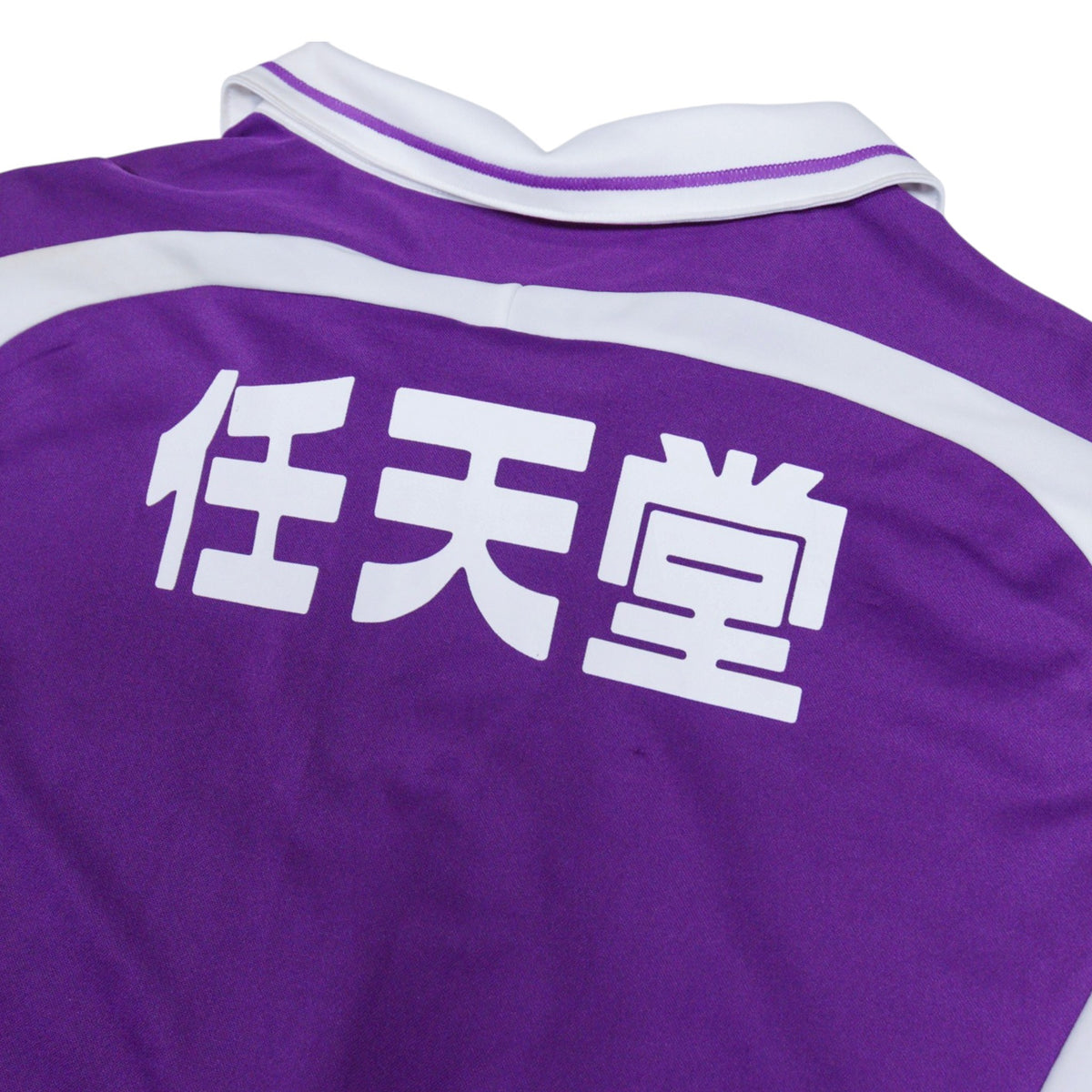 Close-up of the collar and Nintendo print on the Kyoto Sanga shirt