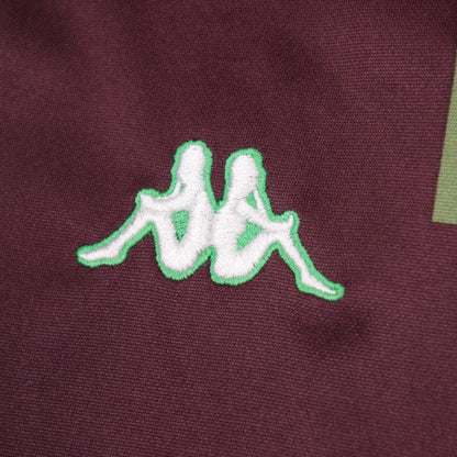 Close-up of the Kappa Omini logo on the chest