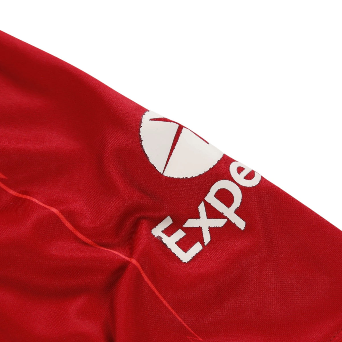 Close-up of Expedia logo printed on the shirt sleeve