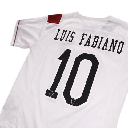 Close-up of the number 10 and shield emblems on the back of the shirt