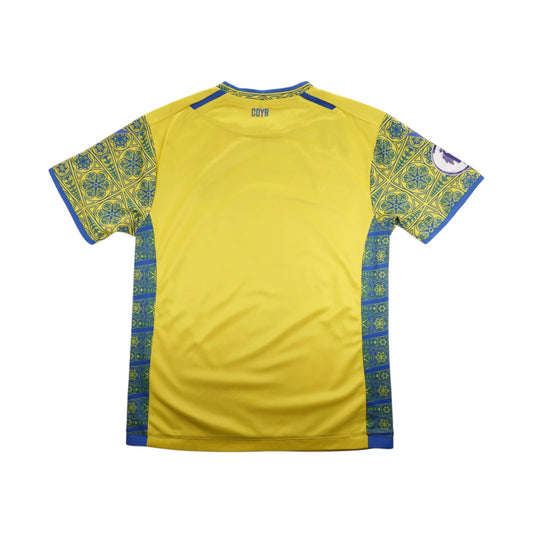 Back of Nottingham Forest away shirt showing 'COYR' text below the collar