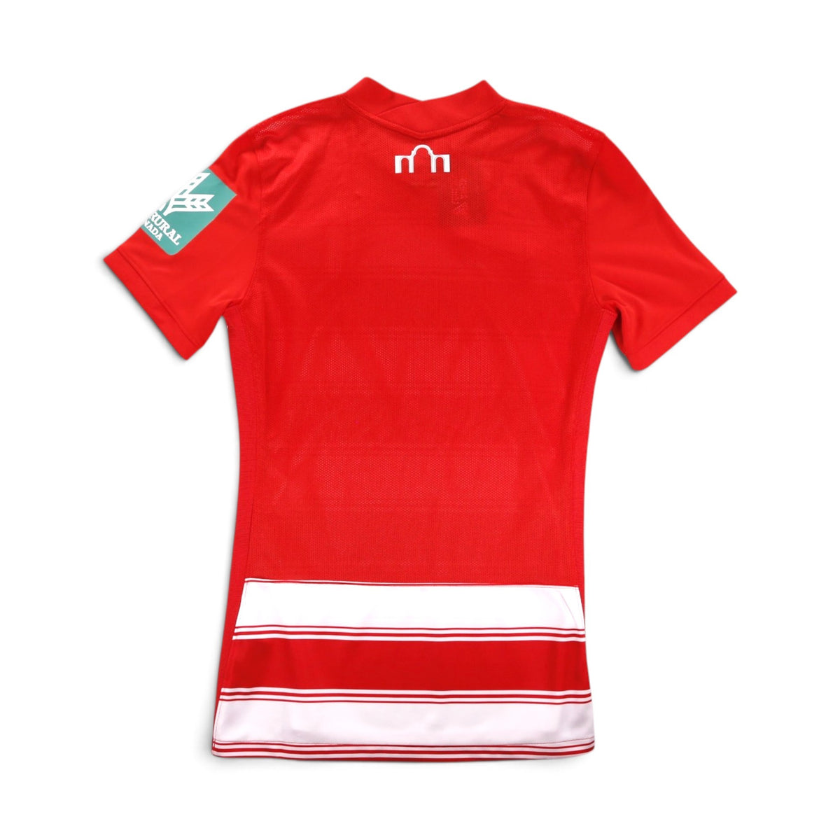 Granada 2021/22 home shirt back view, plain red with white arch emblem below collar