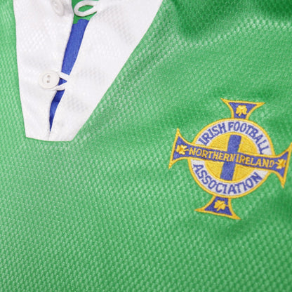 Close-up of the collar, button placket and Irish Football Association crest on the Northern Ireland home shirt