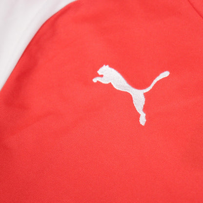 Close-up of the Puma logo on the shirt sleeve