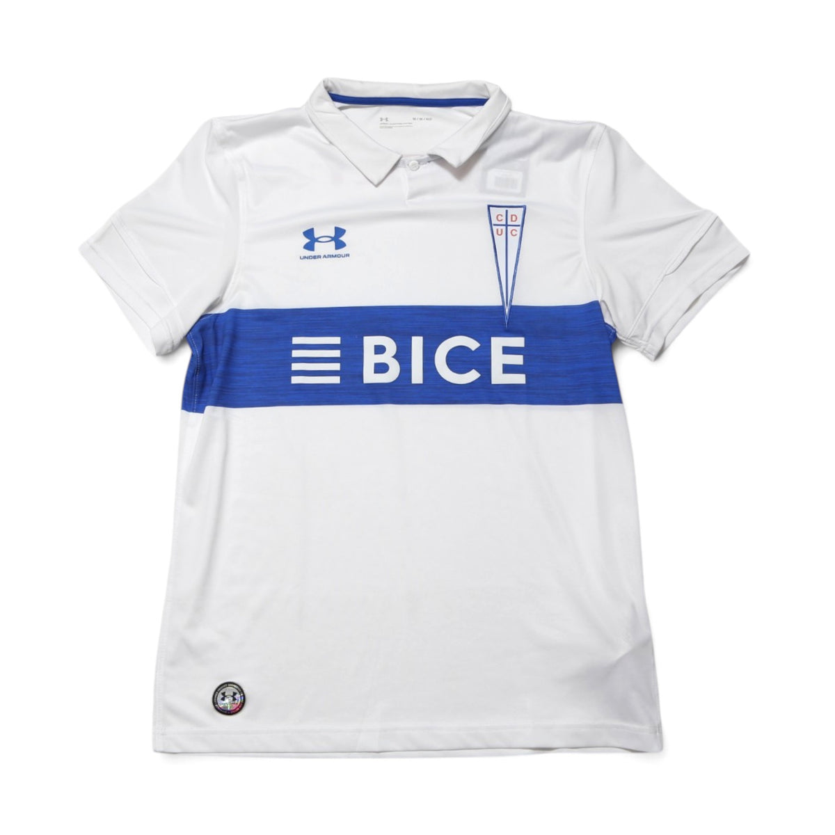 Universidad Católica 2023/24 home shirt front view laid flat