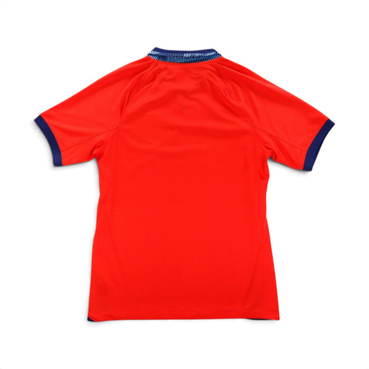 England 2022/23 away shirt, back view, plain red with navy collar