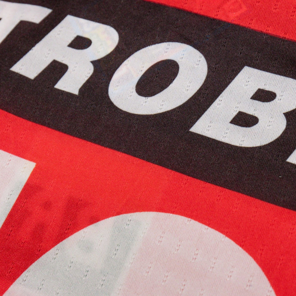 Close-up of Petrobras sponsor print on the back of the shirt