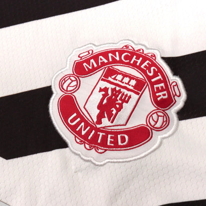 Close-up of the Manchester United crest on the shirt