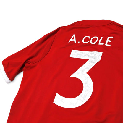 Close-up of A. Cole number 3 print showing surface cracking on 2010/11 England away shirt
