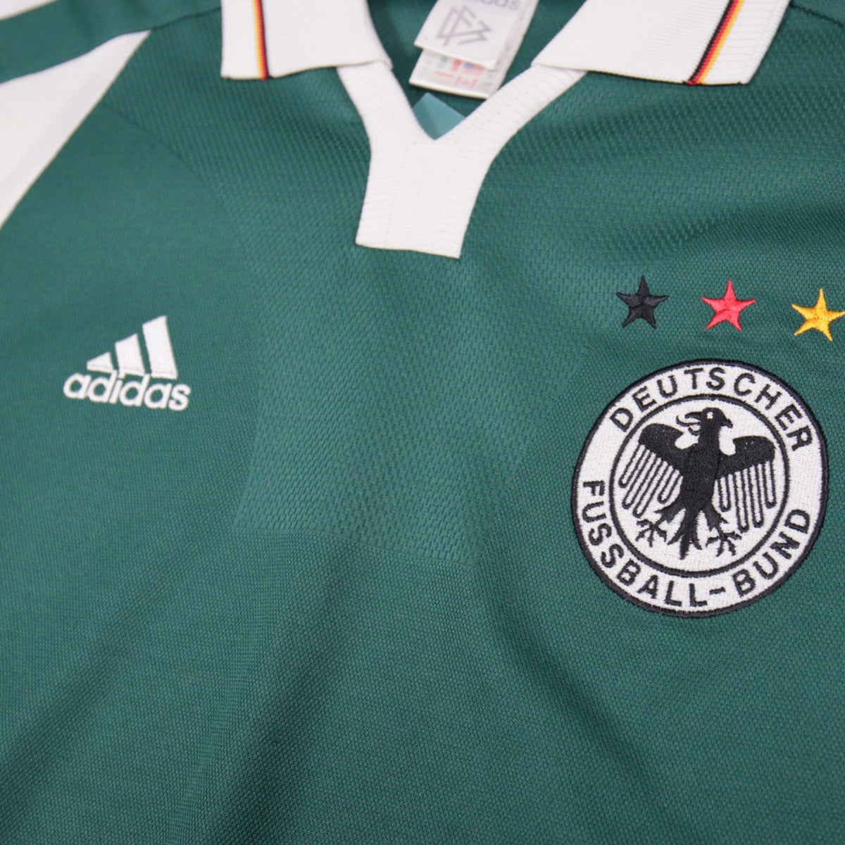 Close-up of DFB eagle crest and adidas logo on the Germany away shirt