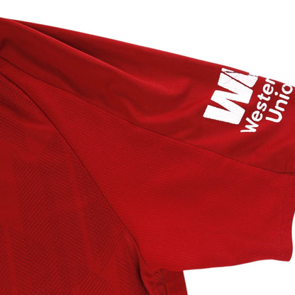 Close-up of the sleeve showing the Western Union logo and collar trim